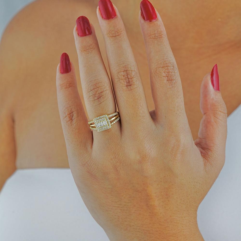 Maral 14 ayar altın rengi yan taşlı baget yüzük